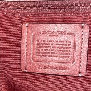 New with tags comes with small matching clutch / wallet